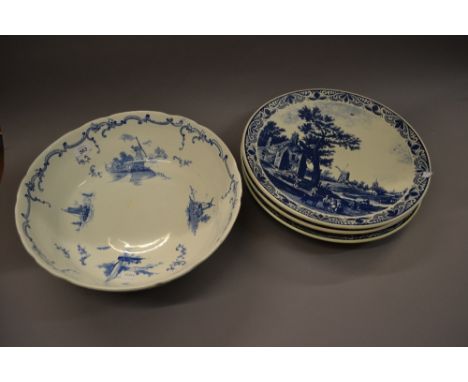 Three large blue and white Delft ware wall plates together with a Delft pattern wash basin