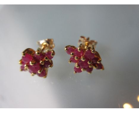 Pair of ruby cluster stud earrings