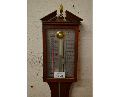 Reproduction mahogany stick barometer in antique style with silvered dial 