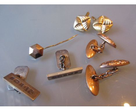 Two pairs of 9ct gold cufflinks, a pair of silver cufflinks and a 9ct gold stick pin