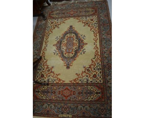 Indo Persian rug with central medallion design on an ivory ground with borders, 6ft x 4ft approximately