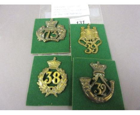 Group of four 19th Century Glengarry Foot Regiment badges including: Cornwall Light Infantry and Duke of Cornwall Light Infan