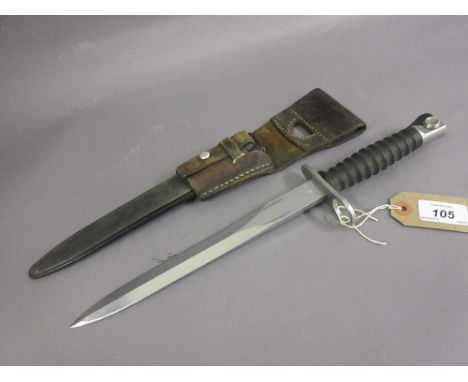 Swiss bayonet with injection moulded scabbard and leather holder marked P. Dubs Seengen with moulded grip