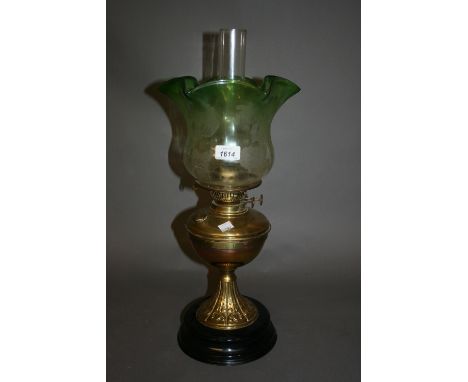 Victorian brass oil lamp with green and clear etched glass shade