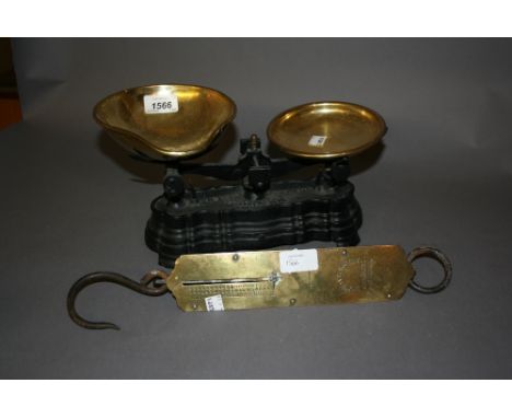 Pair of iron balance scales with brass weights, together with a brass spring balance