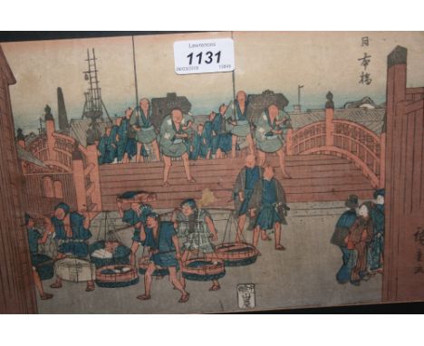Japanese wood block print, figures carrying goods across a bridge by Hiroshige, together with two small framed Japanese water