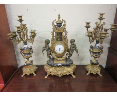 Large 20th Century gilt and dark patinated brass clock garniture in 19th Century French style, the lyre shaped clock case wit