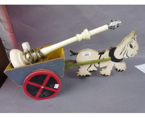Children's wooden pull-along horse and cart together with a cream painted lamp base