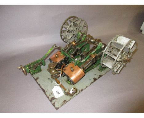 Twin piston horizontal stationary engine with attached paddles