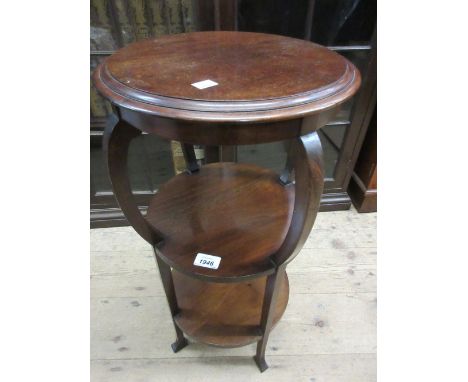 Arts and Crafts mahogany circular three tier occasional table on shaped supports and a mahogany standard lamp (a/f)