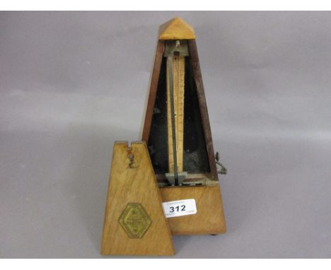 French walnut cased metronome by Paquet