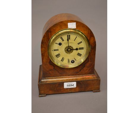 19th Century German walnut dome shaped mantel clock, the painted dial with Roman numerals inscribed Straub Hebting, with a si