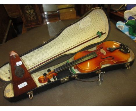 Kohler and Son metronome (at fault) together with a violin and bow in a fitted case