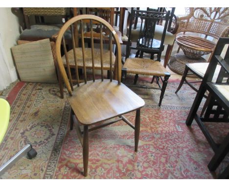 Set of eight mid 20th Century elm stick back dining chairs