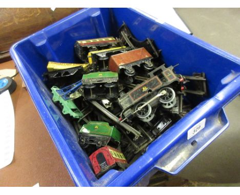 Hornby tin plate clockwork railway set including an engine, various tenders, goods wagons etc.
