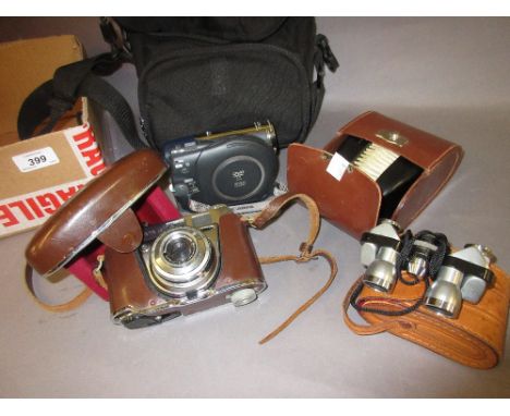 Early Kodak camera in leather case, pair of miniature Japanese binoculars, Canon camcorder and a leather case containing ebon