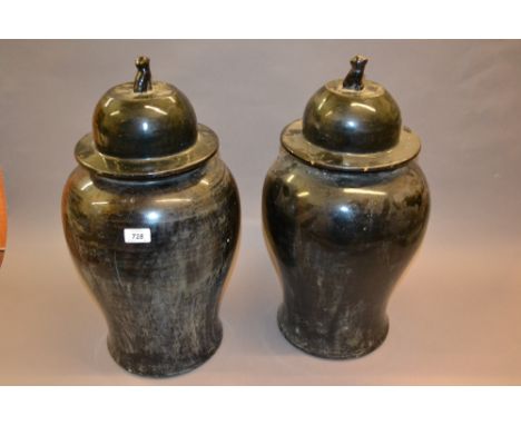 Pair of large black glazed ceramic vases and covers