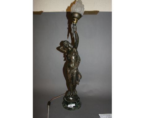 19th or early 20th Century spelter figural table lamp in the form of a girl holding a torch