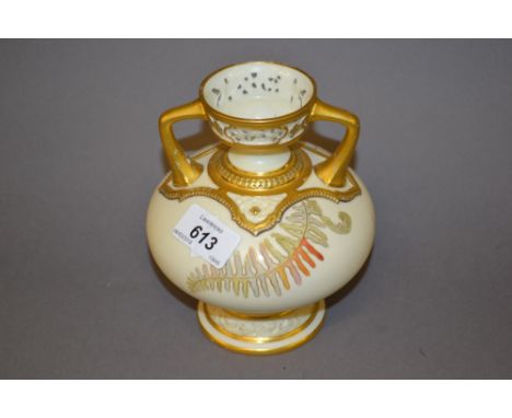 Royal Worcester blush ivory two handled squat baluster form vase having floral decoration and pierced rim, 6ins high