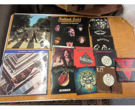 Two Beatles L.P.'s, Rolling Stones L.P. and various 45 speed records for Motorhead and Hawkwind