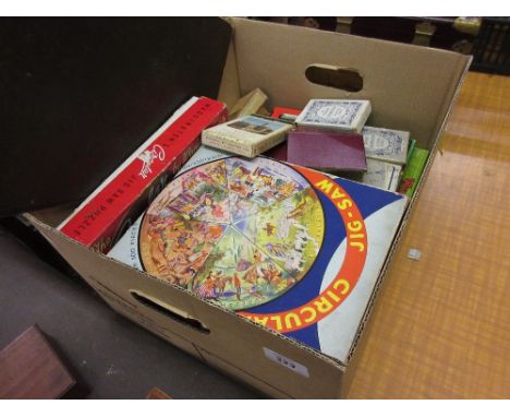 Box containing a quantity of various childrens games and playing cards etc.