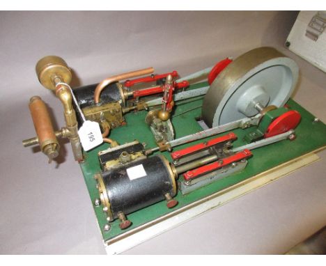 Large green painted twin piston horizontal stationary engine