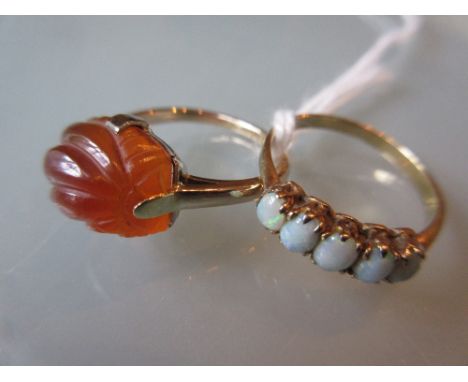 Five stone opal ring together with a carved cornelian set ring