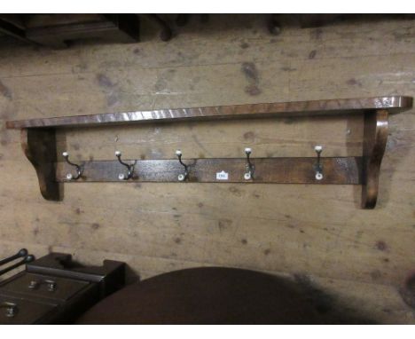 Large set of oak wall mounting coat hooks with shelf