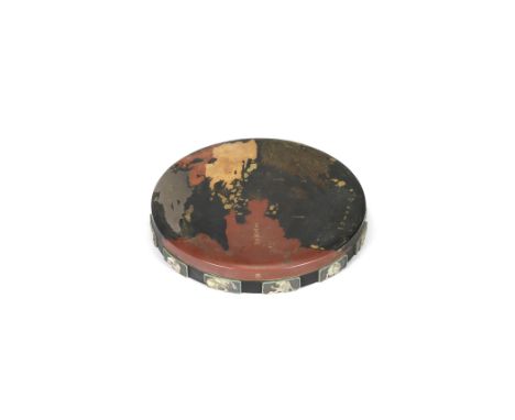 An unusual, inlaid, and lacquered-wood circular suzuribako (box for writing utensils)By a member of the Nomura family, Edo pe