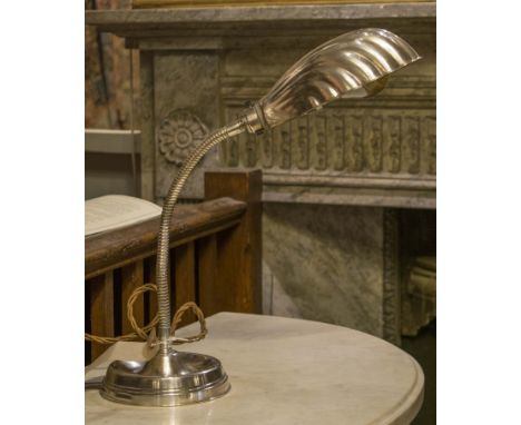 DESK LAMP, early 20th century, silvered metal with adjustable, articulated support and shell shade, 52cm H max