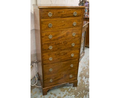 TALL CHEST, late 19th/early 20th century mahogany with seven short drawers on bracket feet, 61cm W x 132cm H x 44cm D. (with 