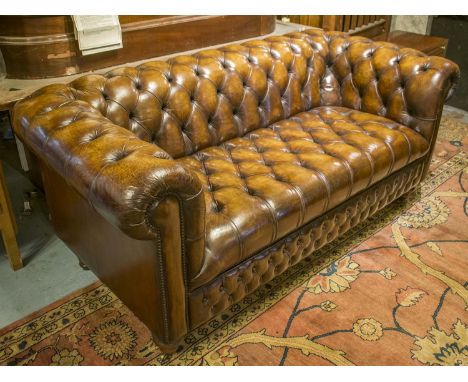 CHESTERFIELD SOFA, vintage hand finished and deep button upholstered leaf brown leather with curved back and arms, 194cm W.