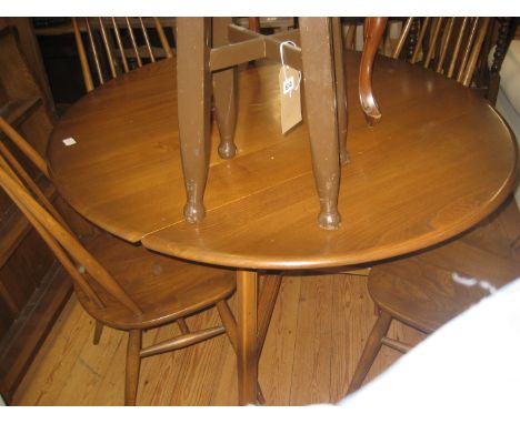 Medium Elm Drop Leaf Ercol Table with 4 Ercol Spindle Back Chairs