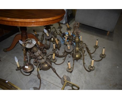 A selection of vintage brass ceiling light and wall light fittings