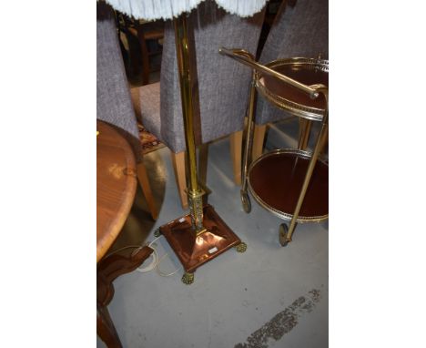 An early 20th Century brass and copper standard lamp