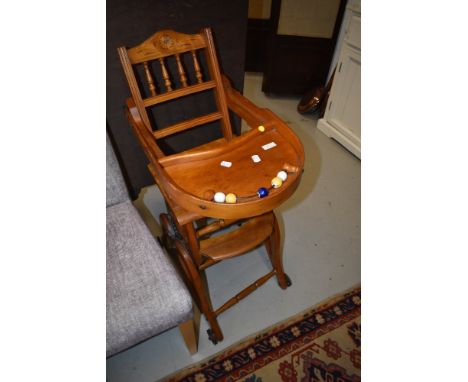 A Victorian light mahogany child's high/low chair