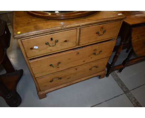 A 19th Century stripped chest of two over two drawers having drop handles and bracket feet, lovely proportions, width approx.
