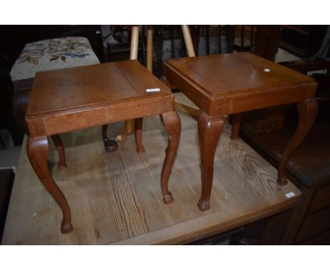 A pair of vintage light oak occasional tables on cabriole legs