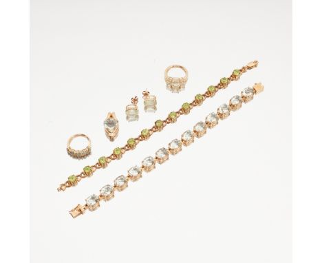 A collection of gem-set jewellery to include a 9ct gold peridot and white topaz set bracelet, a 9ct gold prasiolite bracelet;