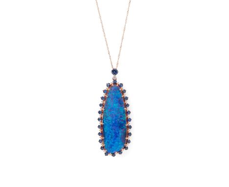 An opal, diamond and sapphire set pendant claw set with a tapered oval boulder opal, in a border of alternating round brillia