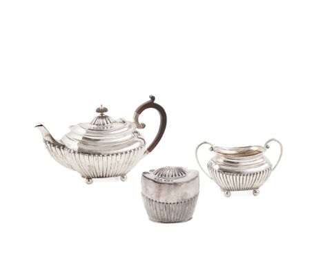 A matched 1920s bachelor's teapot and twin handled sugar basin James Dixon &amp; Sons Ltd, Sheffield 1924, each of demi-flute