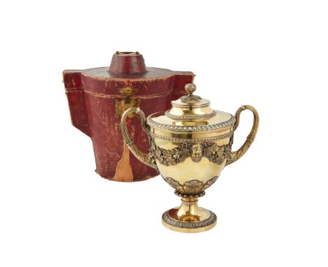 An impressive cased George III silver-gilt twin handled cup and cover Benjamin Smith II &amp; James Smith III, London 1810, t