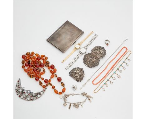 A collection of jewellery to include an early 20th Century seed pearl and diamond set pendant necklace, a coral and seed pear