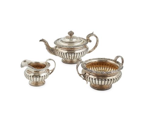 Y A George III three piece tea service James McKay, Edinburgh 1817, comprising a teapot, twin handled sugar basin and milk ju