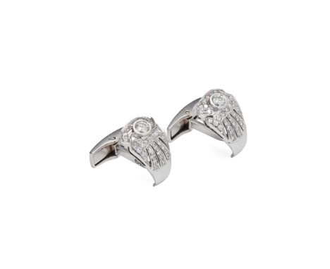 A pair of diamond set cufflinks each principal terminal collet set with a round brilliant-cut diamond, the pierced tapering s