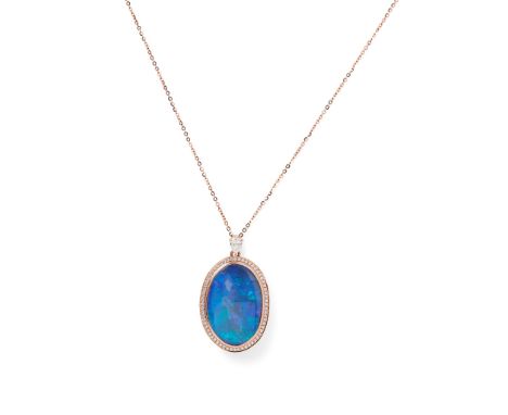 An opal and diamond set pendant necklace collet set with an oval cabochon boulder opal, in a single border of small round bri