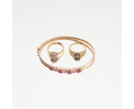 to include a ruby and diamond set bangle, stamped 9k; an 18ct gold diamond set cluster ring, and an 18ct gold sapphire and di