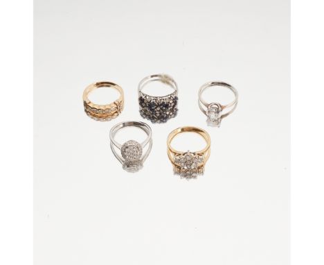 A collection of gem-set rings to include a diamond set cluster ring, claw set with a floral cluster of nine round brilliant-c
