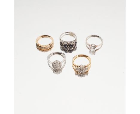 A collection of gem-set rings to include a diamond set cluster ring, claw set with a floral cluster of nine round brilliant-c