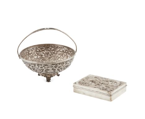 A Chinese export silver table cigarette box marks for Wang Hing and Company, of rectangular form, embossed decorated trailing